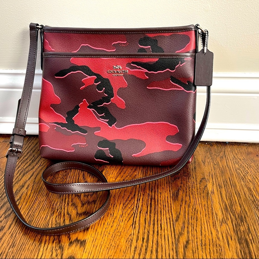 Like new red camo Coach bag.